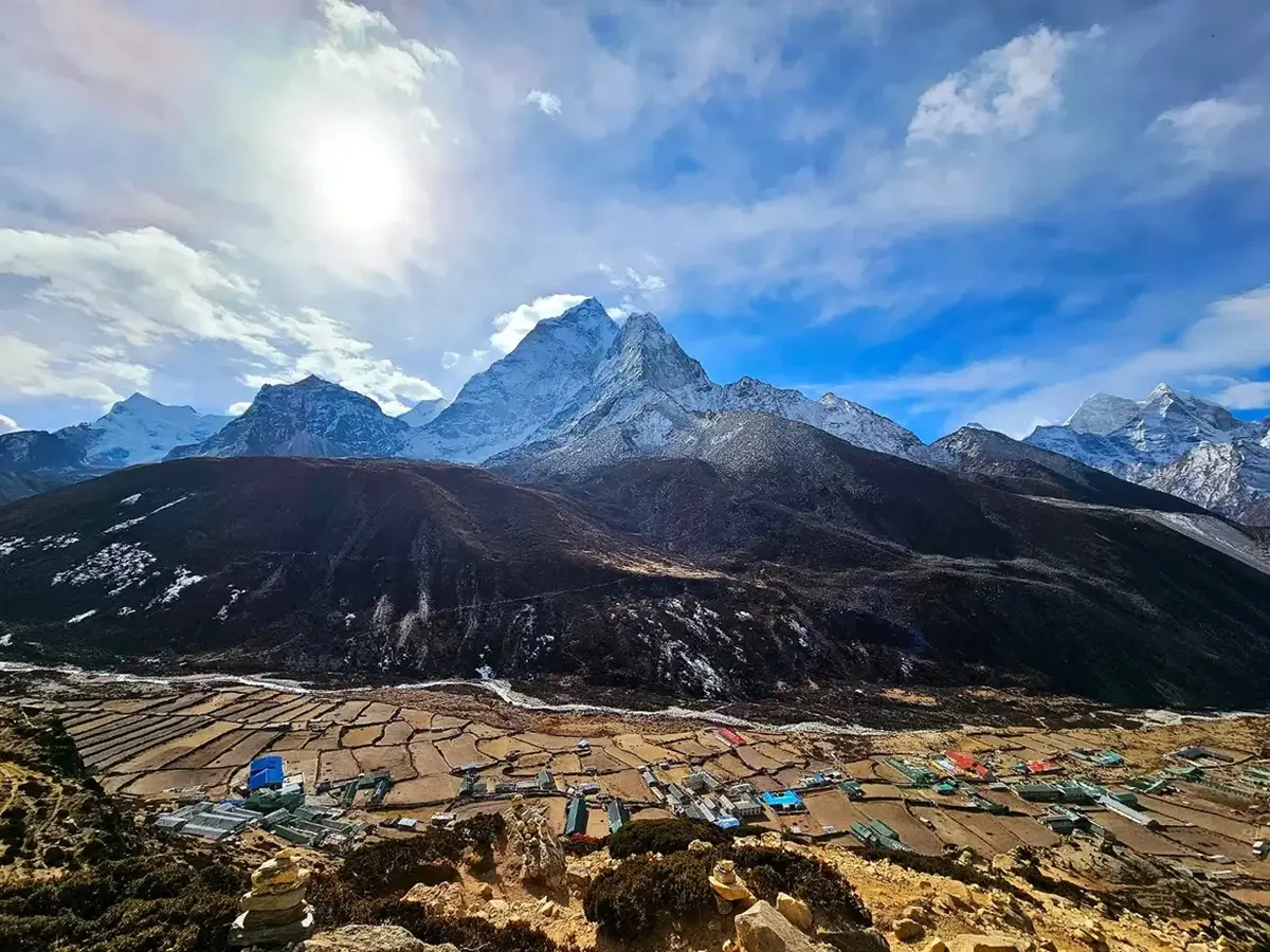 View of Dingboche and surrounding Himalayan peaks from the Nangkartshang Peak acclimatization hike